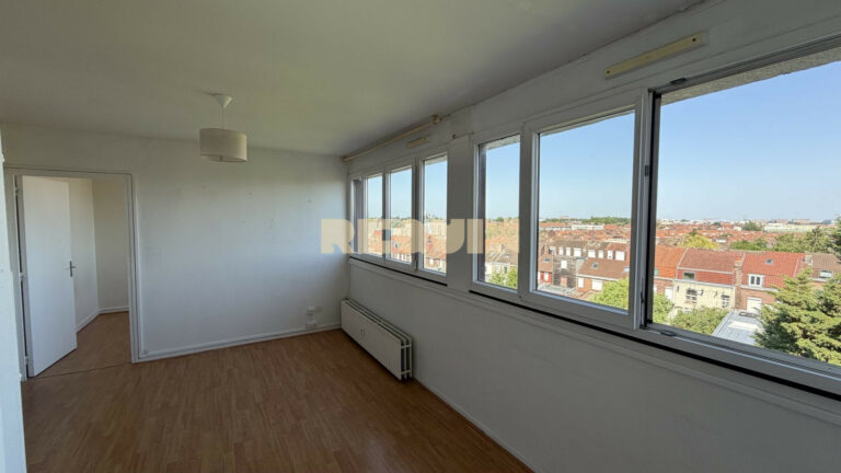 Appartement 2 pièces à Ronchin — T2 en résidence avec parking et cave — photo 1